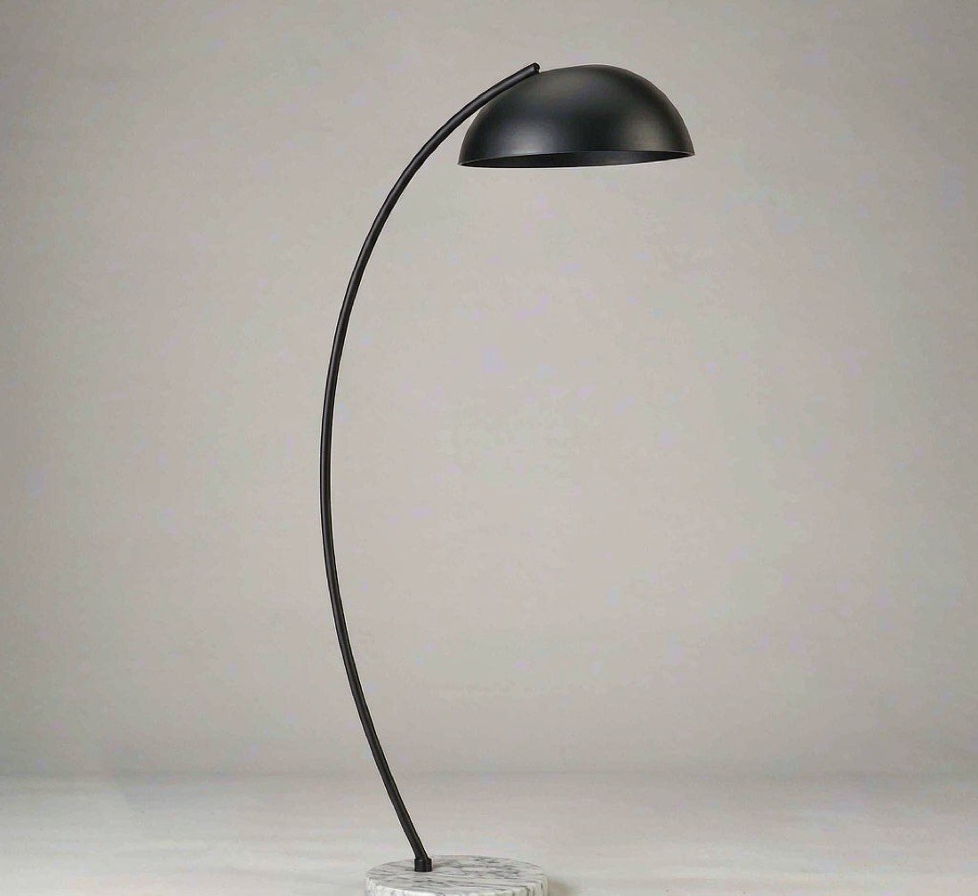 Arc floor lamp with black curved pole and marble base